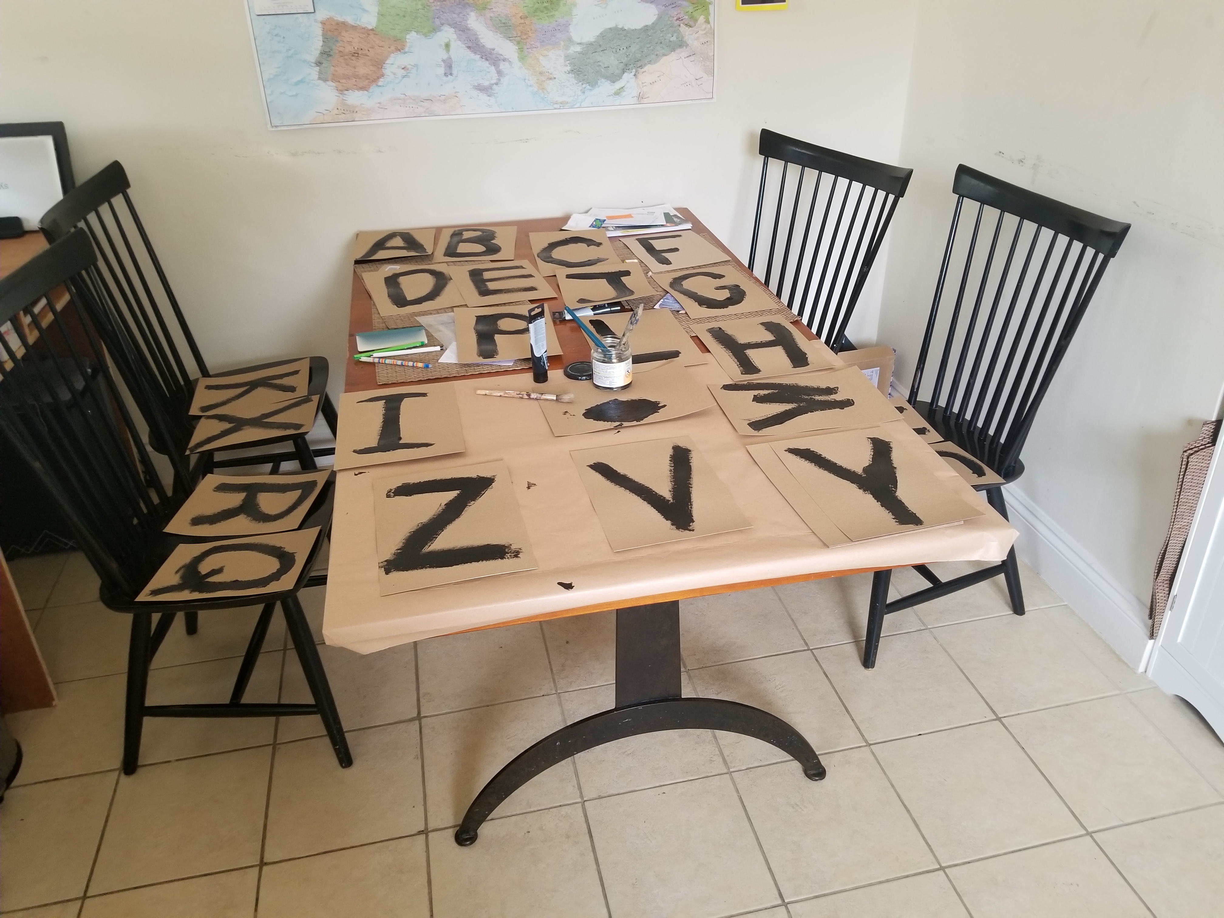 Hand-painting letters on paper